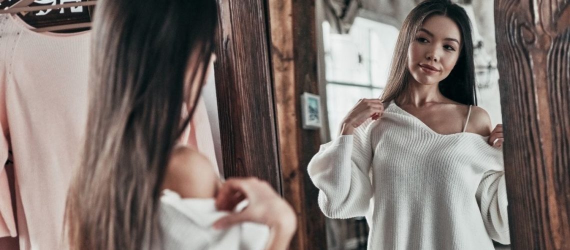 girl looking in mirror